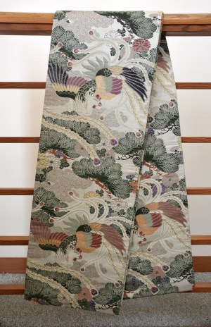 Obi - Peacocks with dark green pine branches