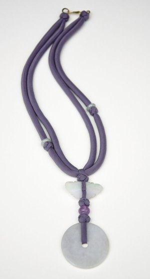 Necklace with antique jade beads, purple cord